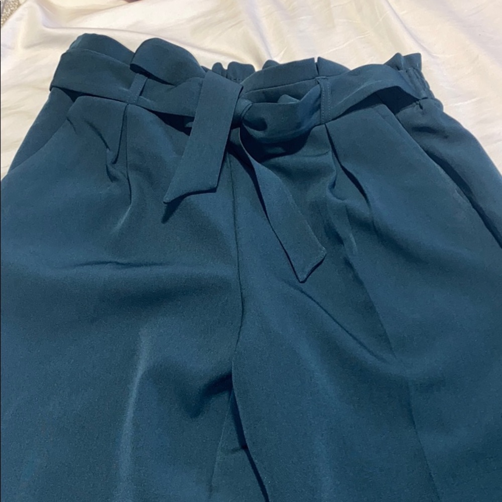 Cropped forest green pants.